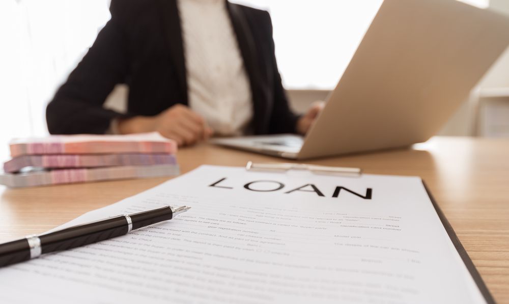 Loan Clipboard with Computer — Loretta Davison Financial Solutions In Shellharbour, NSW
