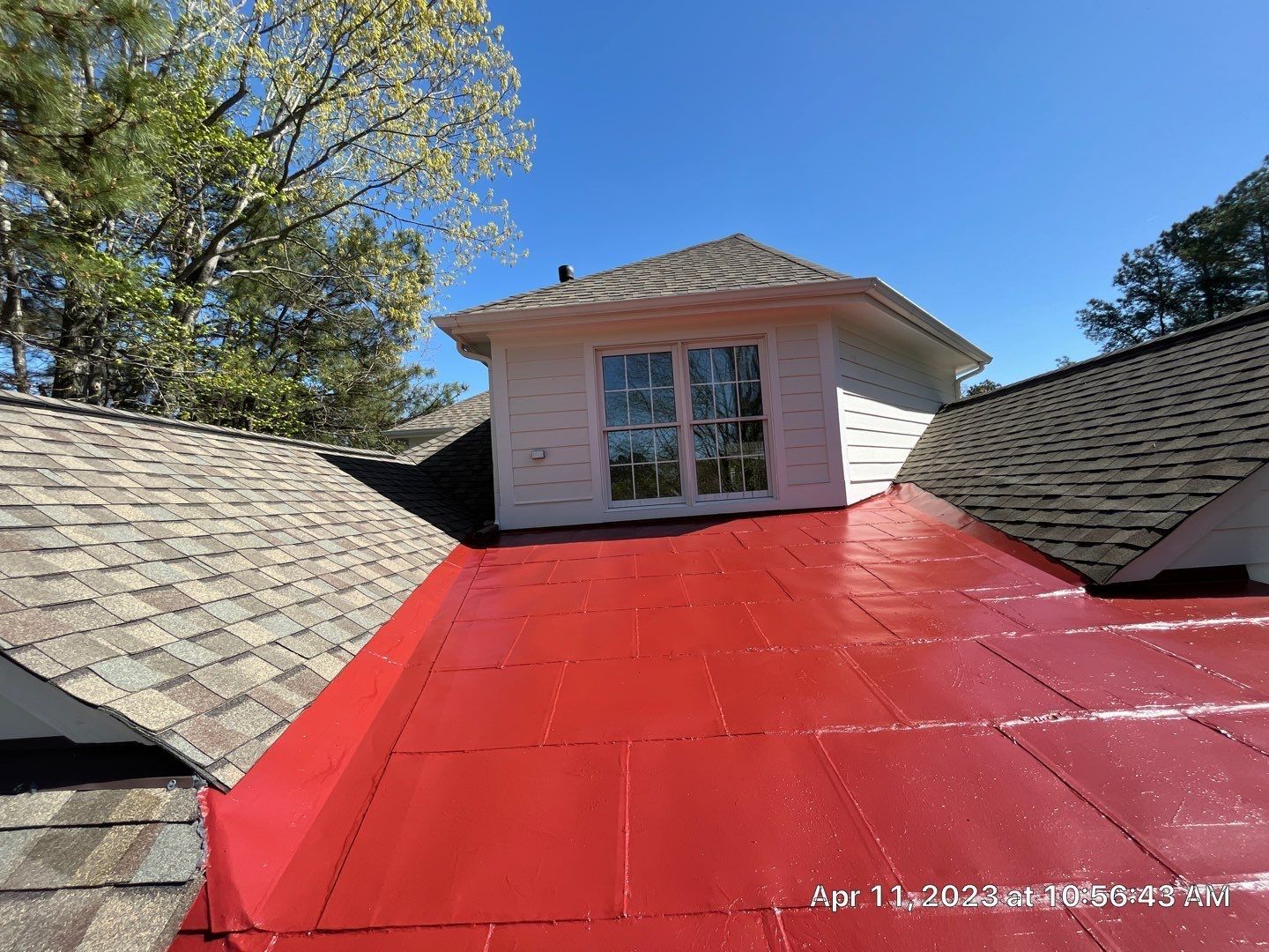 After image of RETEX metal recoating in Glen Allen VA. Red metal roof recoating. 