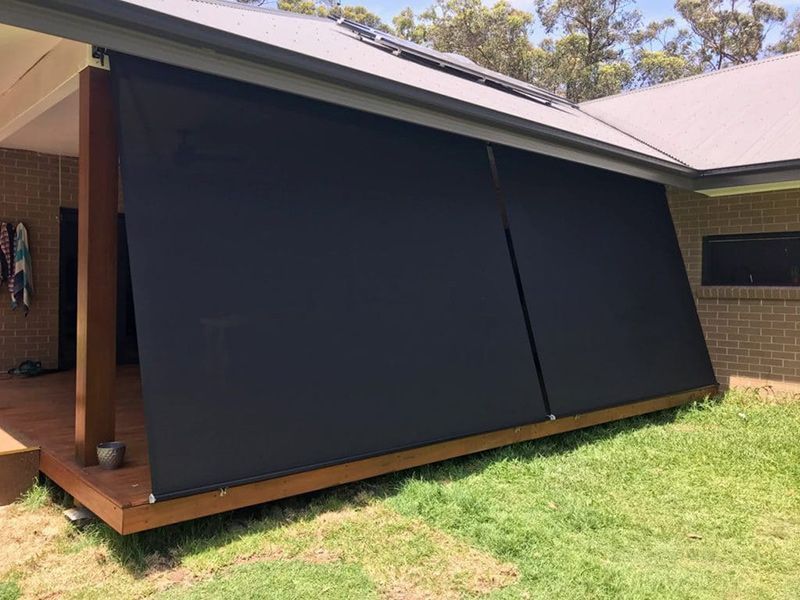 Black Outdoor Roller Blinds On A Deck — Winning Blinds in Cardiff, NSW