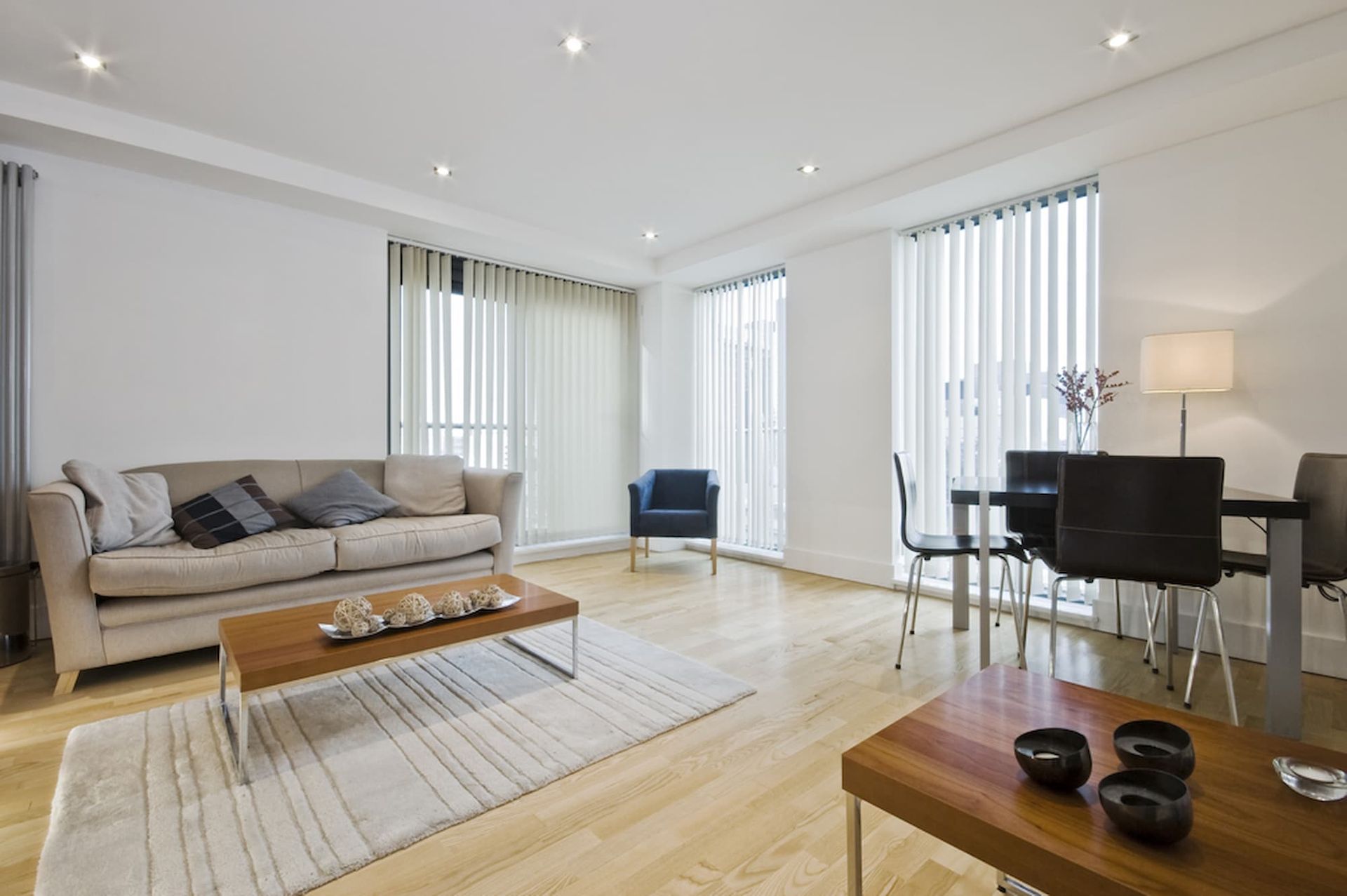 A Living Room with A Couch a Table and Chairs — Winning Blinds in Newcastle, NSW