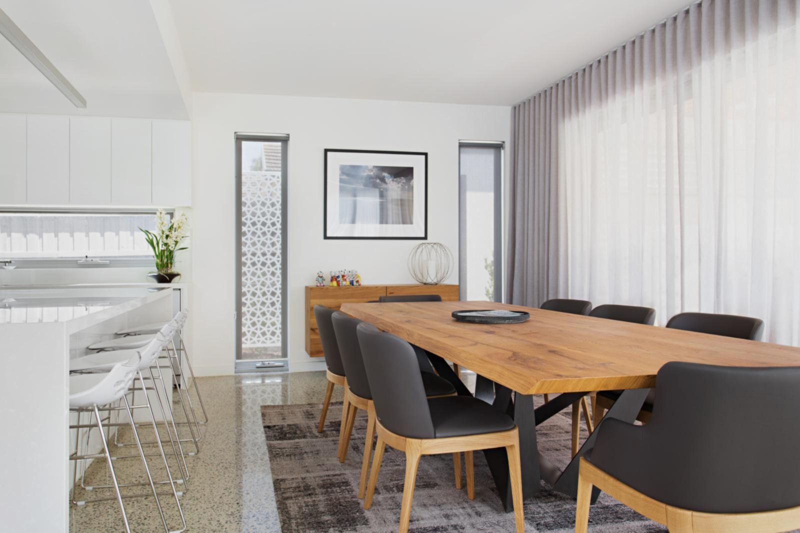 A Bedroom With a Bed , Curtains and a Window  — Winning Blinds in Cardiff, NSW