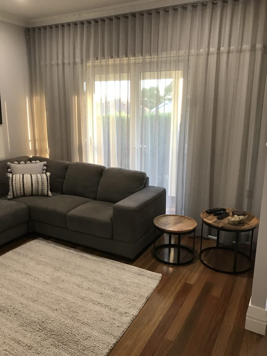 A Living Room with A Couch, Two Tables, and A Rug — Winning Blinds in Hunter Valley, NSW