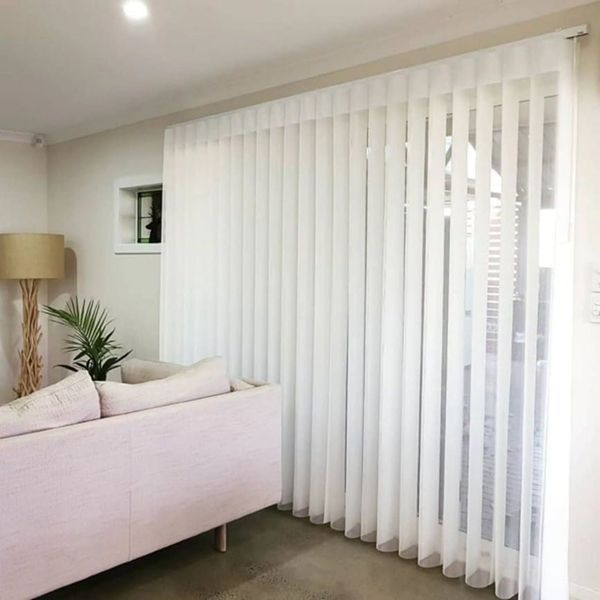 A White, Sheer Curtain Covers A Sliding Glass Door — Winning Blinds in Cardiff, NSW