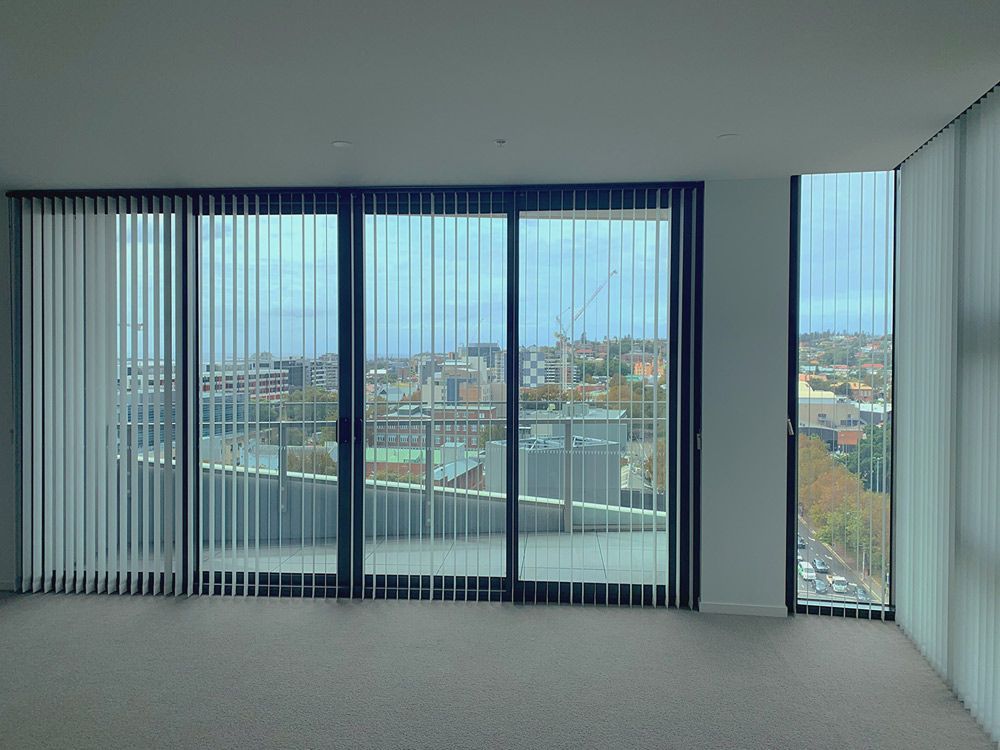 Installed Vertical Blinds on Glass Doors