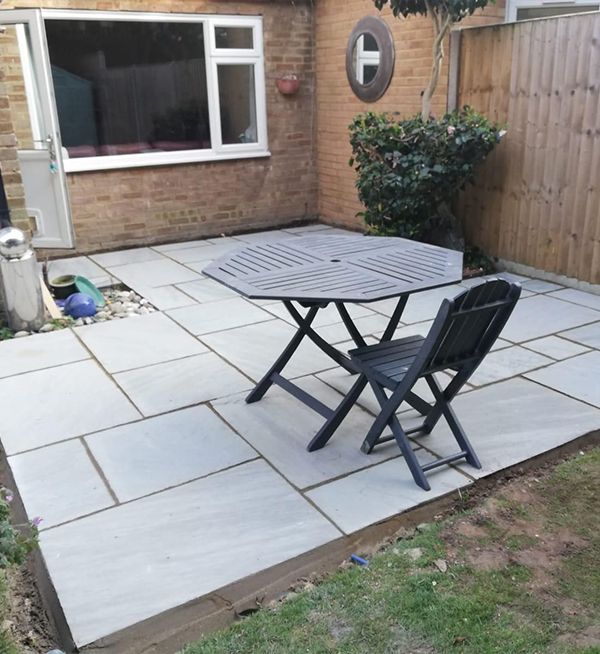 Completed patio and garden space in Woking by Surrey Hills, ready for enjoyment.