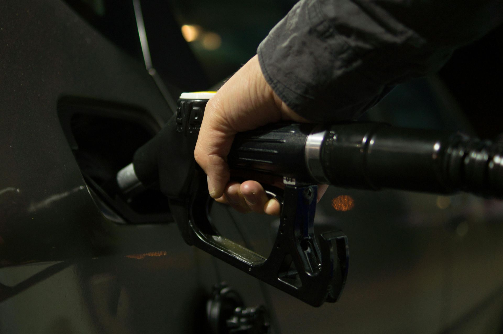 putting petrol in car