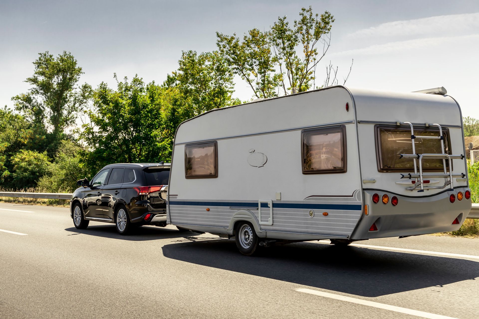 car towing a caravan