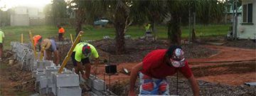Workers Laying Bricks — Bricklaying in Townsville, QLD Workers Laying Bricks — Bricklaying in Townsville, QLD