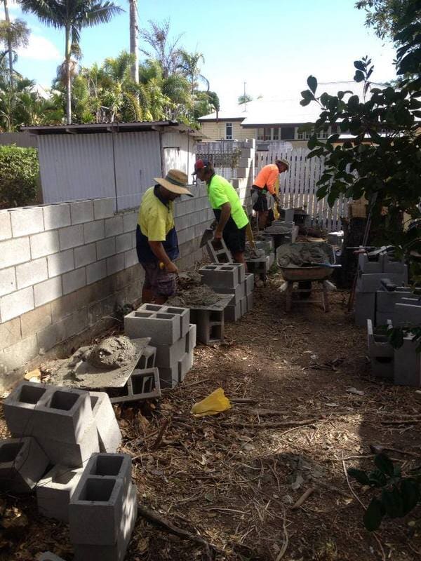 Workers Layering Concrete Bricks — Bricklaying in Townsville, QLD