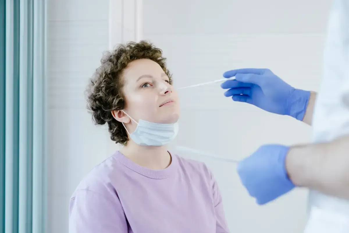 Woman consulting a GP about a cervical screening test for women's health