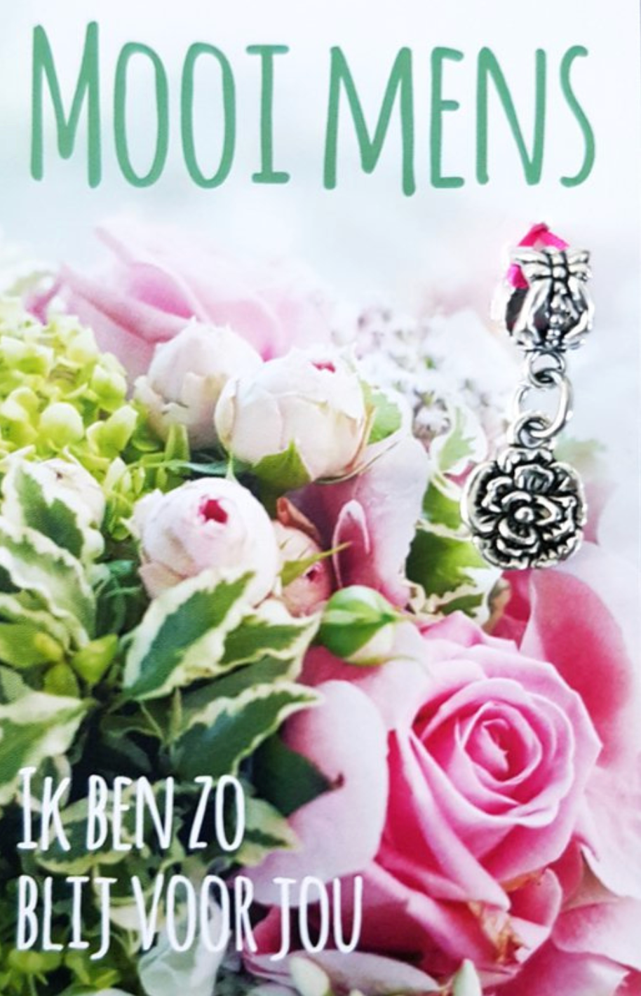 Bouquet of pink and white flowers, with a charm. Text reads