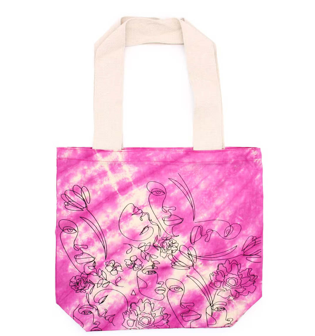 Roze draagtas met beige hengsels en een bloemenmotief aan de voorkant
