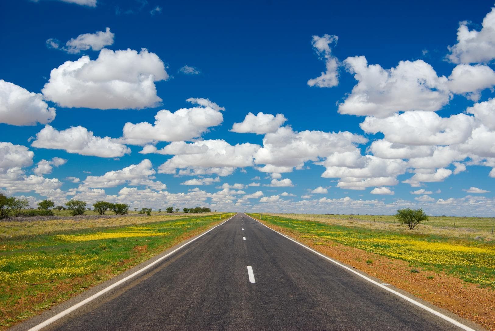 A Road That Is Going Through A Field — Fahlstrom Scaffolding Cairns Pty Ltd in Tableands, QLD