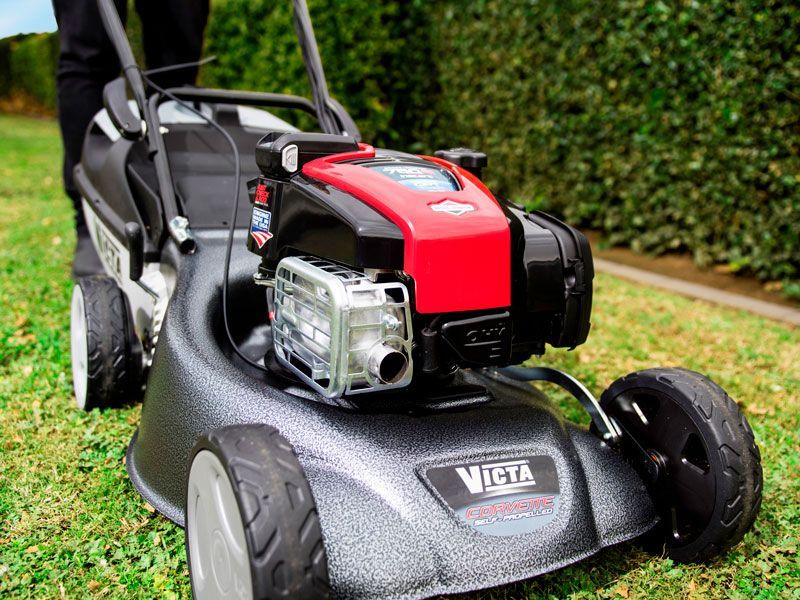 A Person is Using a Victoria Lawn Mower to Cut the Grass — Stockers & Partridge In Paterson, NSW