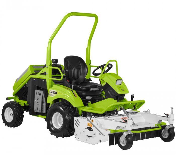 A Green and White Lawn Mower With a Broom Attached to It — Stockers & Partridge In Paterson, NSW
