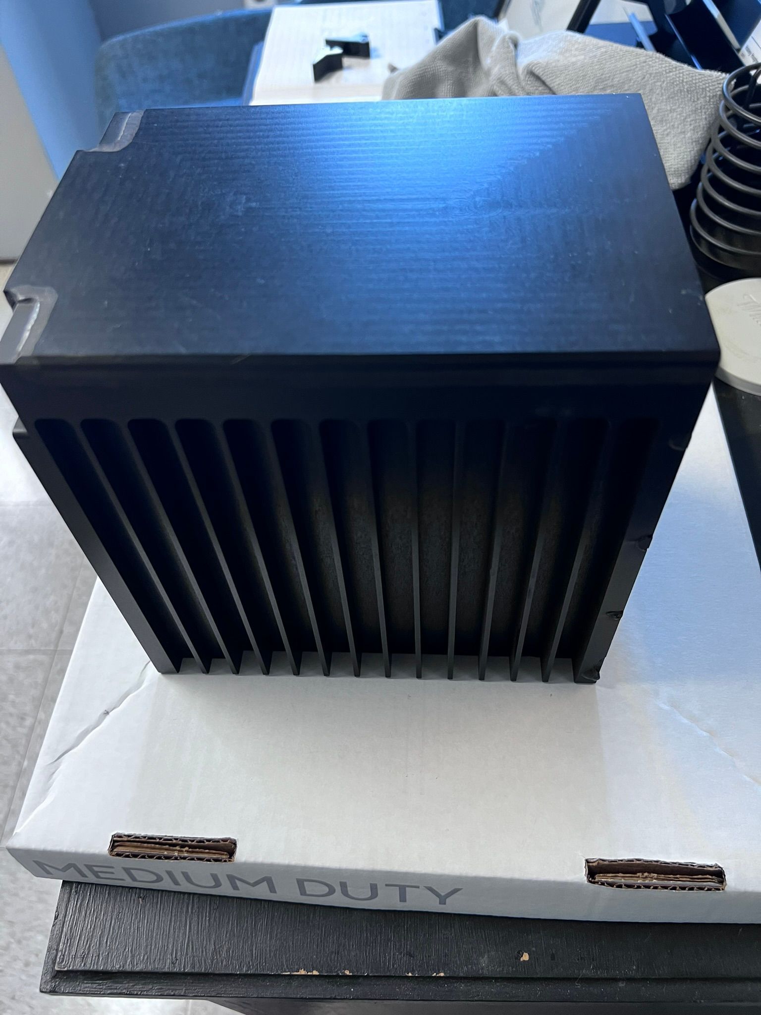 A black box with the word utility on it