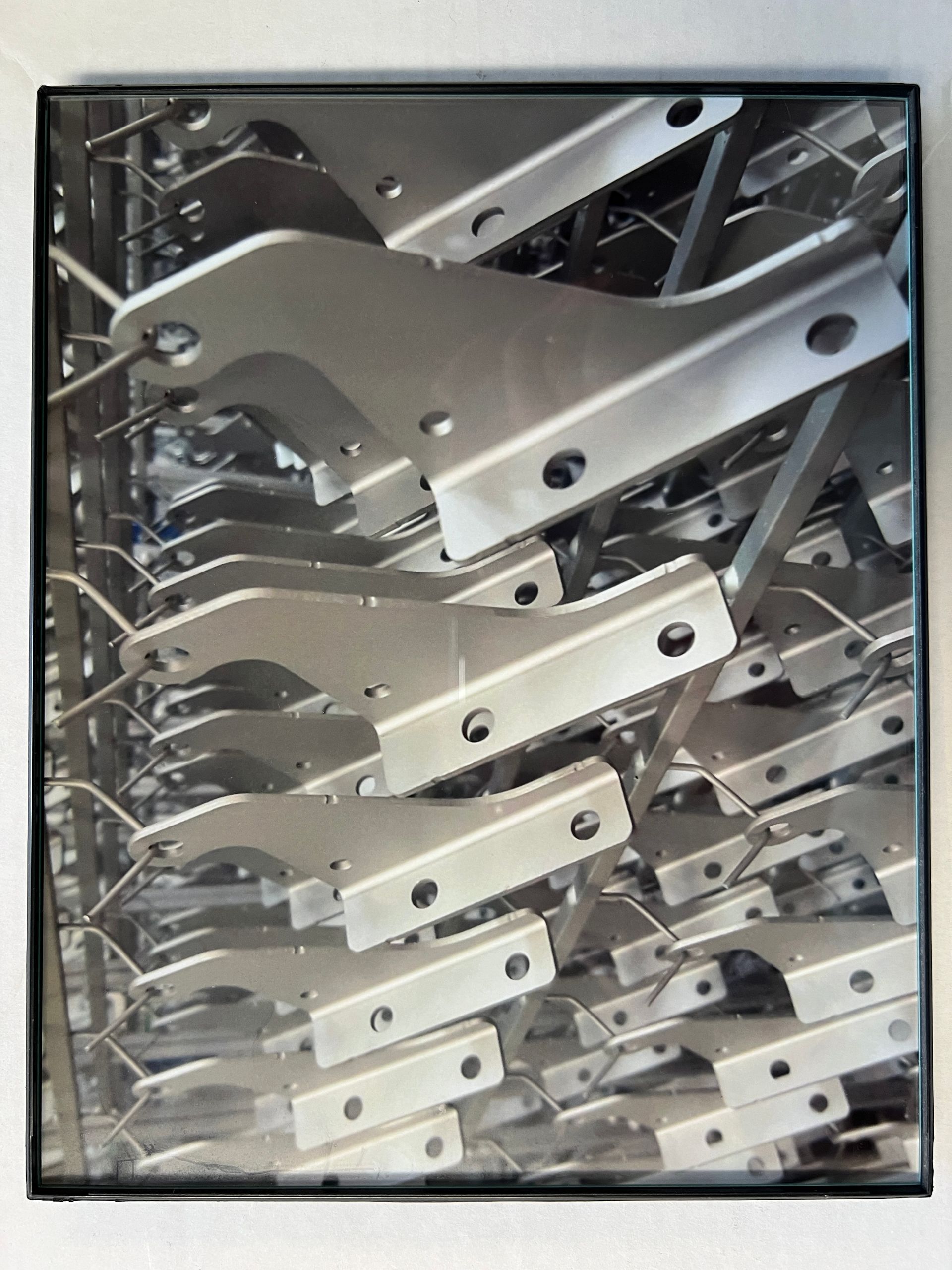 A bunch of metal pieces are stacked on top of each other