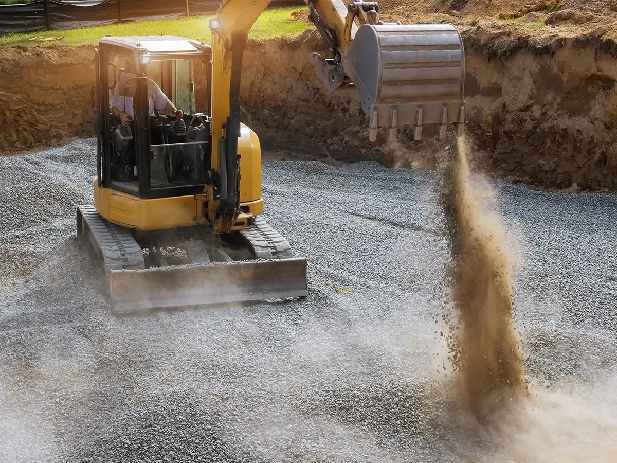 Preparing building pad with moisture conditioning and compaction