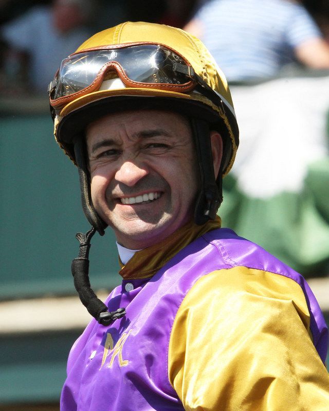 Jockey Joe Bravo smiling for a photo