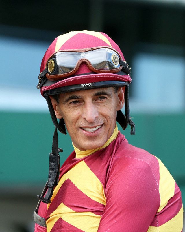 Jockey John Velazquez smiles before the races at Churchill Downs.