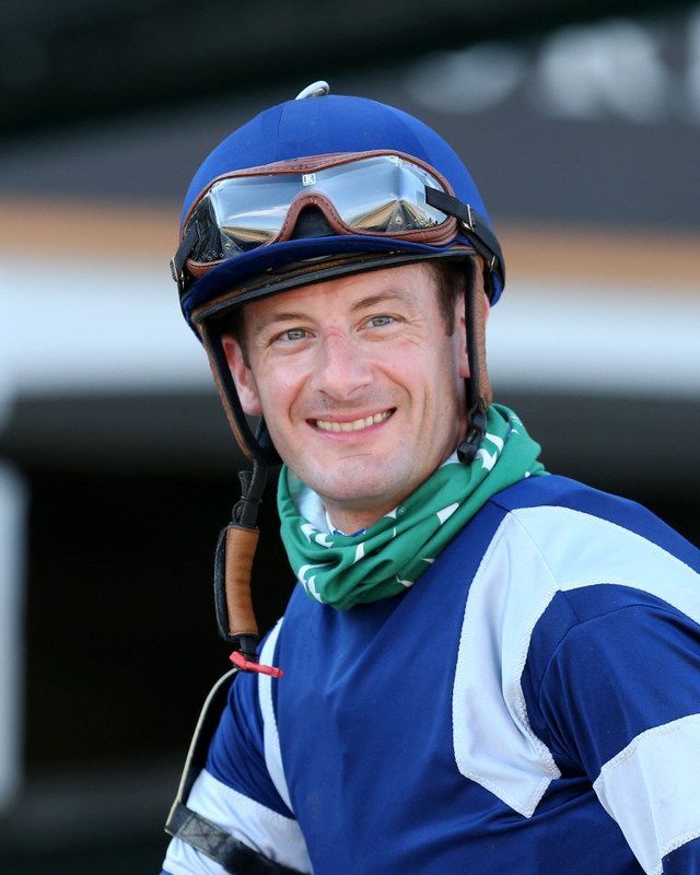 Julien Leparoux wearing blue helmet and googles before a race