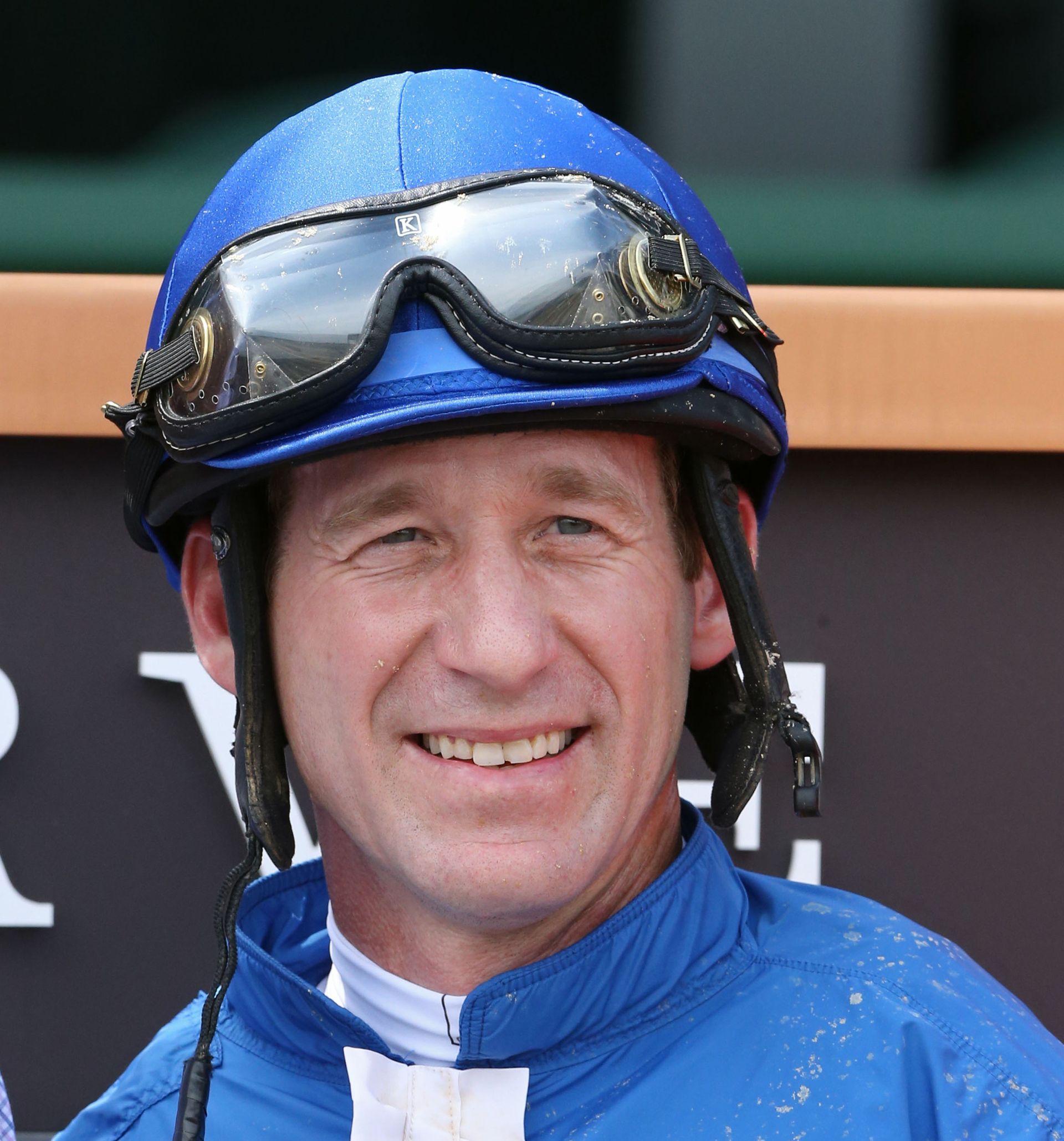 Jockey Rodney Prescott posing for a photo at the race track