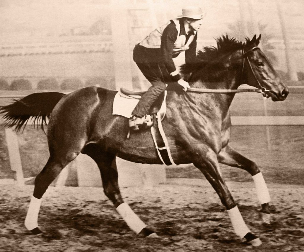 George Woolf riding Seabiscuit