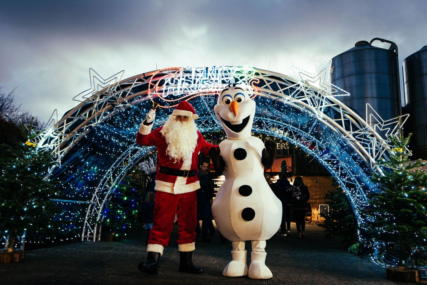 Visitors browsing festive stalls at Lancaster Christmas Market, held at Lancaster Brewery