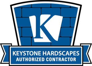 Keystone Hardscapes authorized contractor logo with white K on blue brick shield
