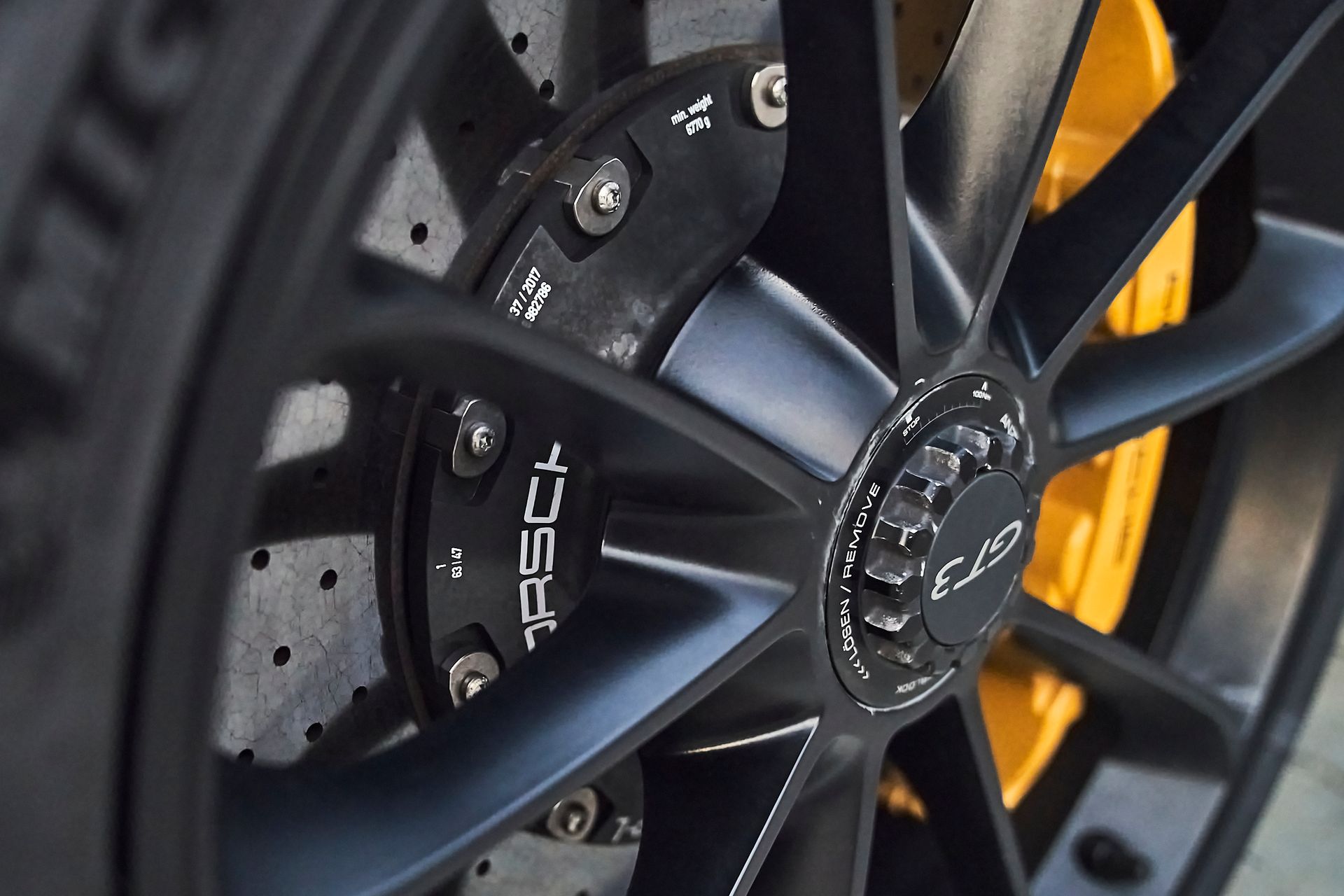 A close up of a car wheel that says rsch on it