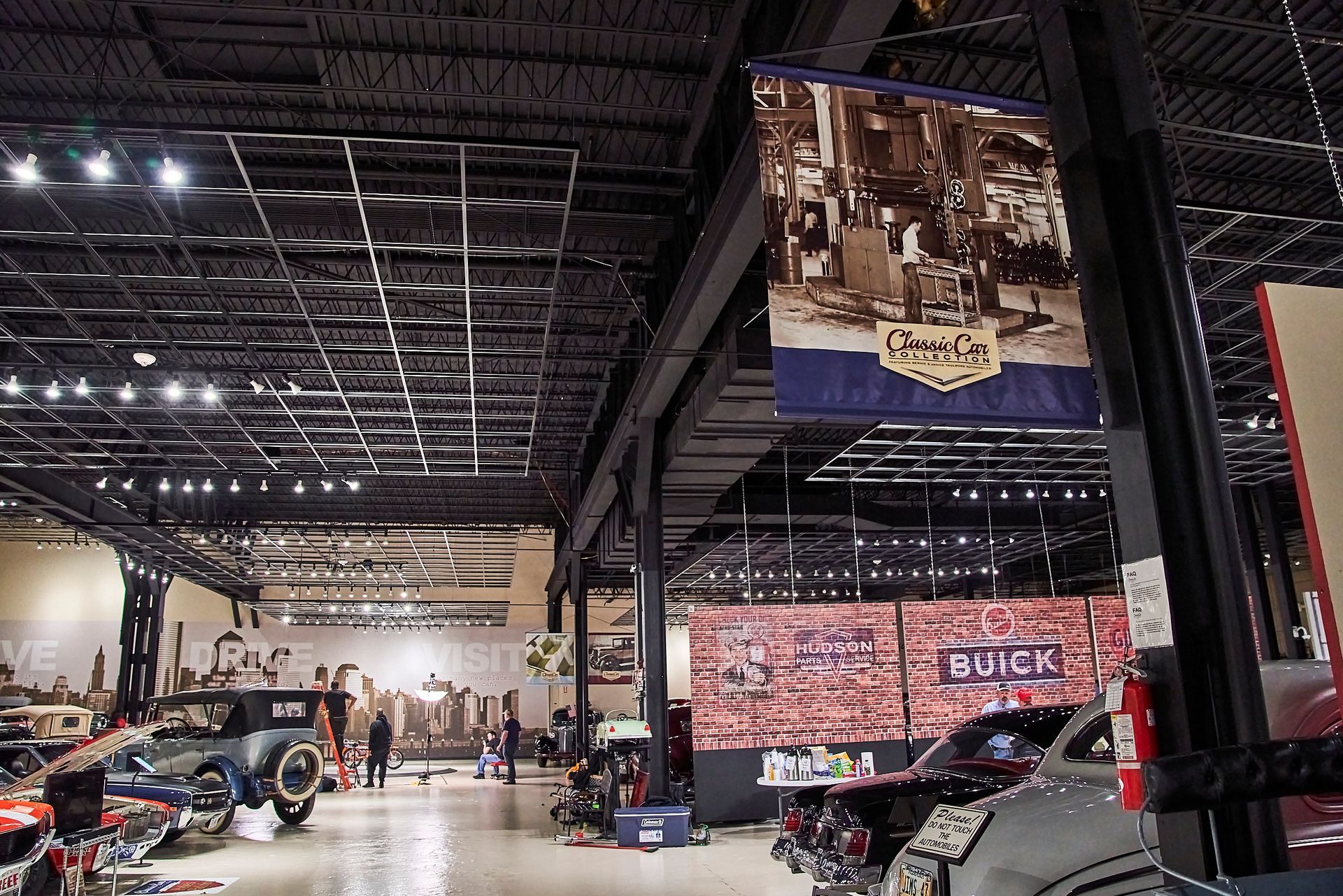 A buick sign hangs from the ceiling of a building