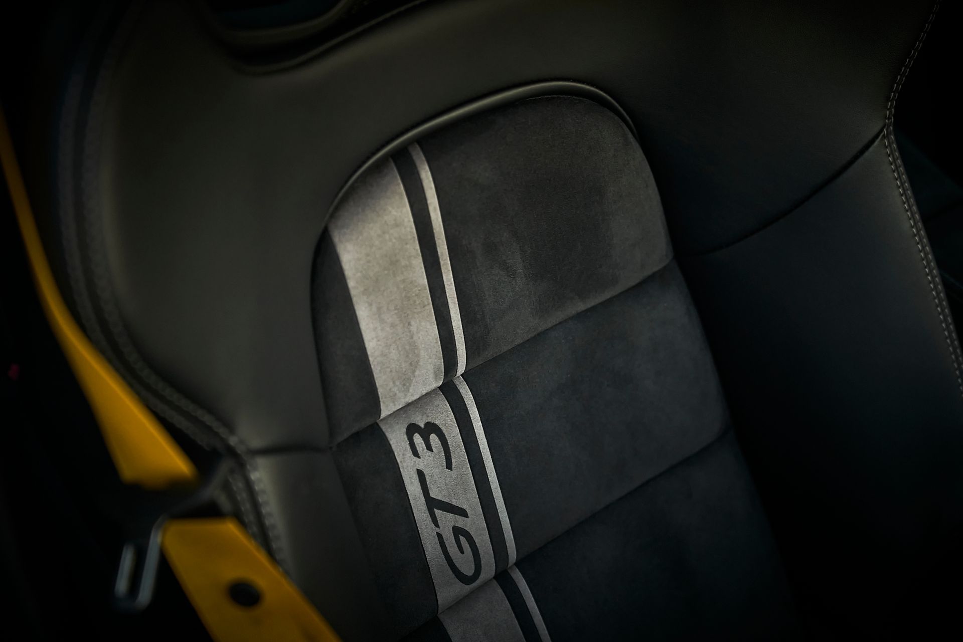 A close up of a car seat that says gt3 on it