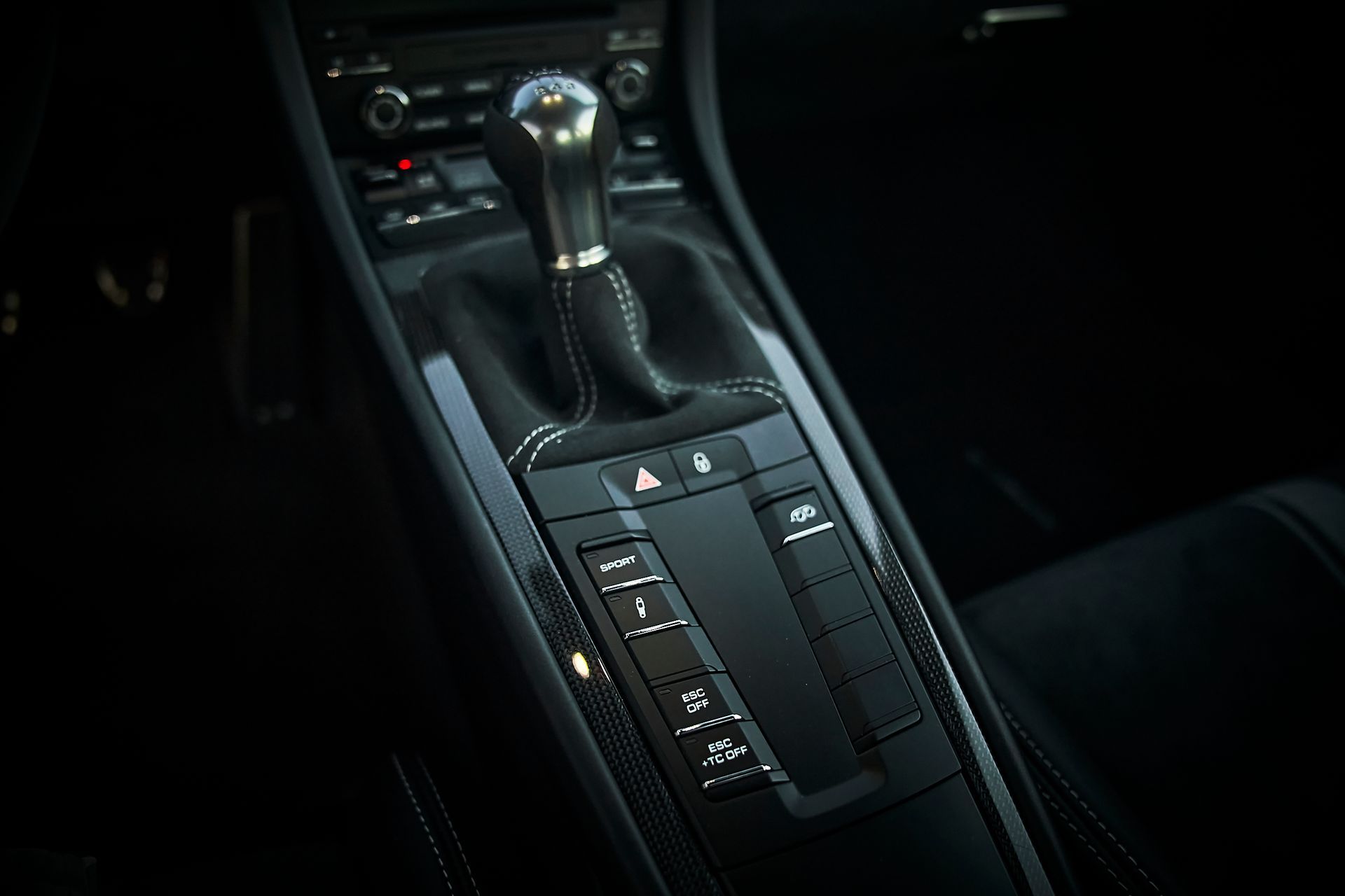 A close up of a shifter in a car.