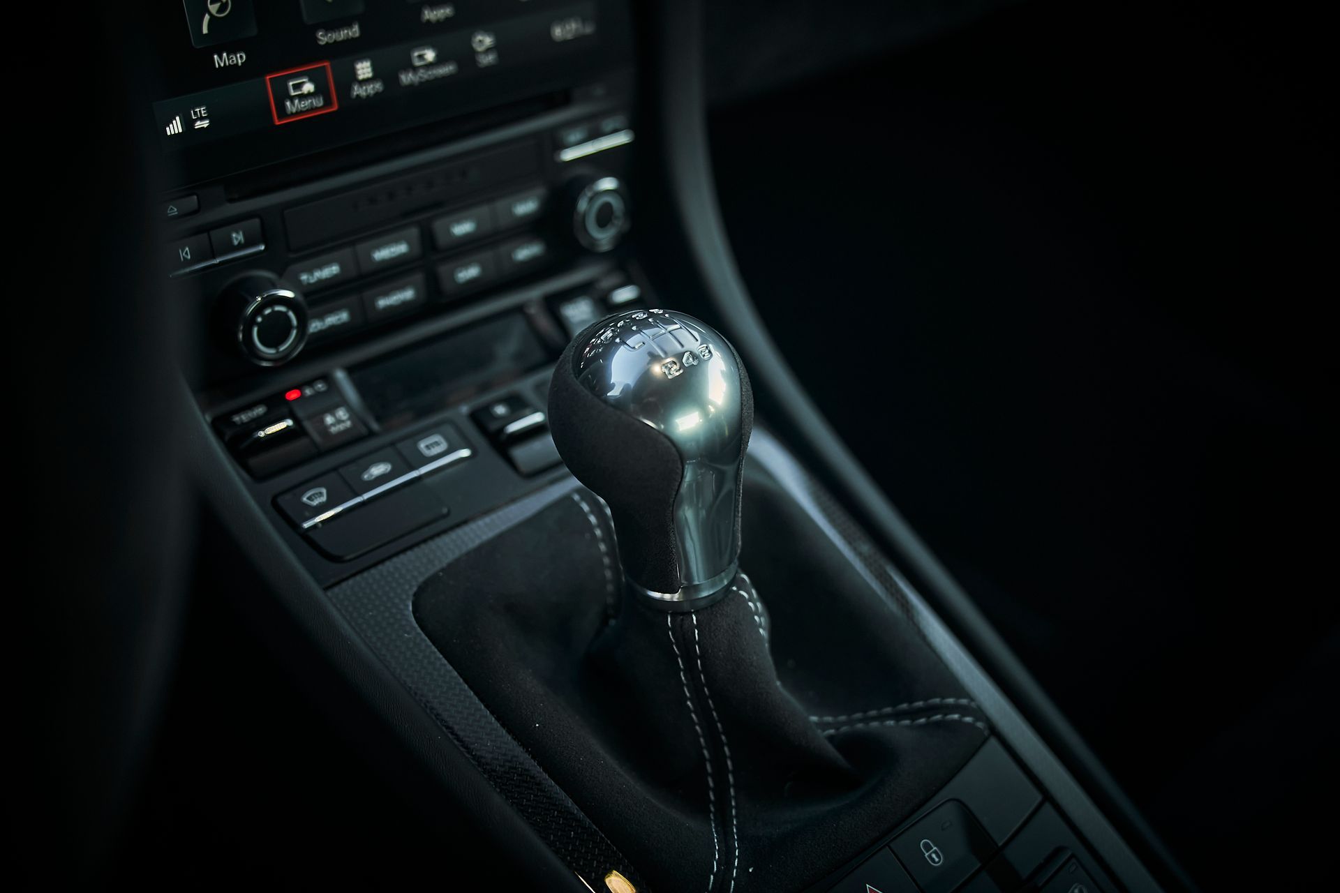 A close up of a shifter in a car