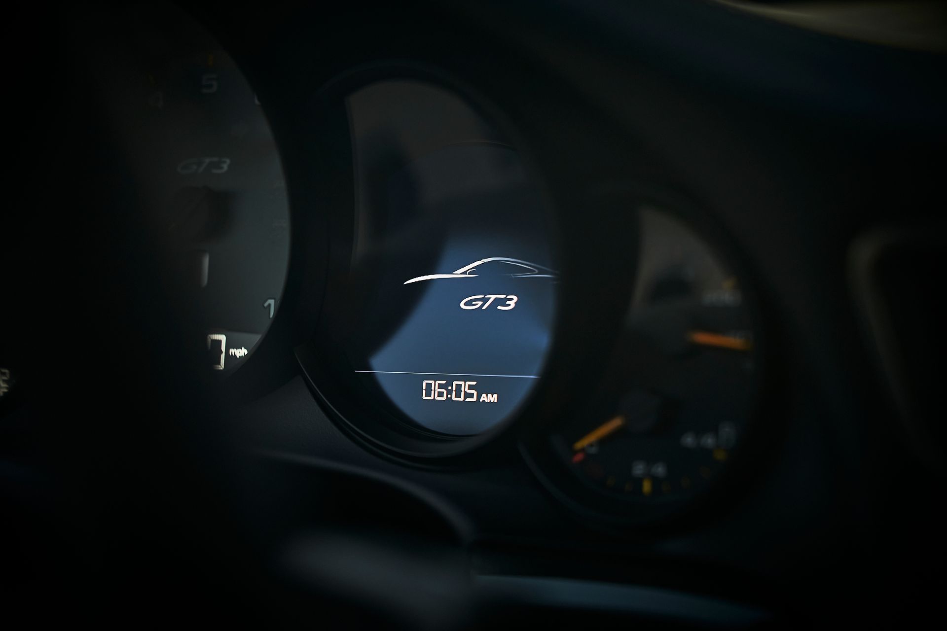 A close up of a car dashboard with a speedometer that reads 0.645