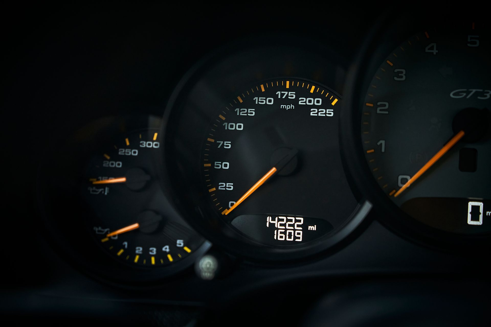 A close up of a car 's dashboard with a digital display.