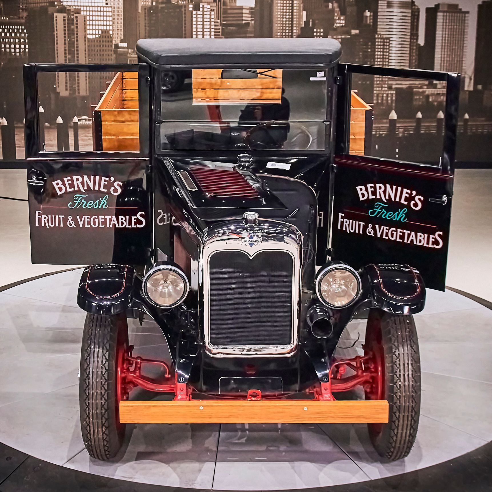 An old truck that says bernie 's fresh fruit and vegetables