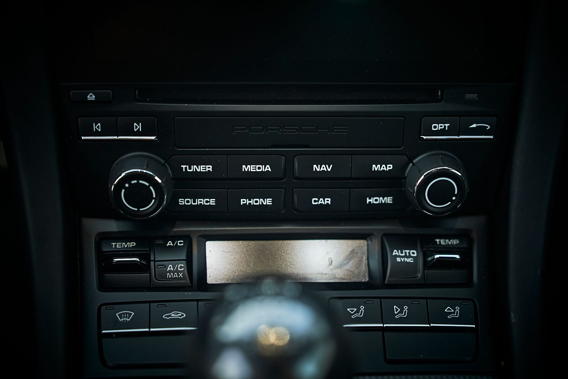A close up of a car radio in a car