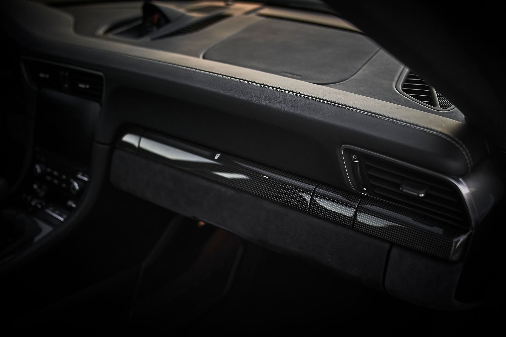 A close up of the dashboard of a car