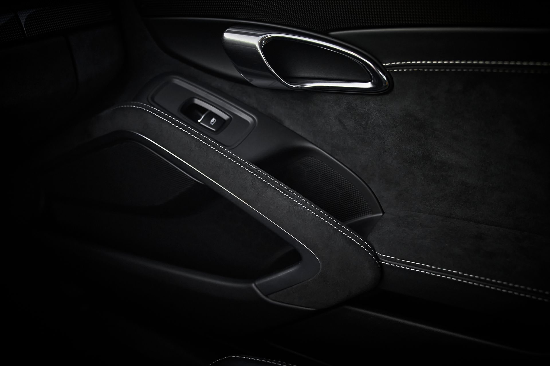 A close up of a door handle on a car