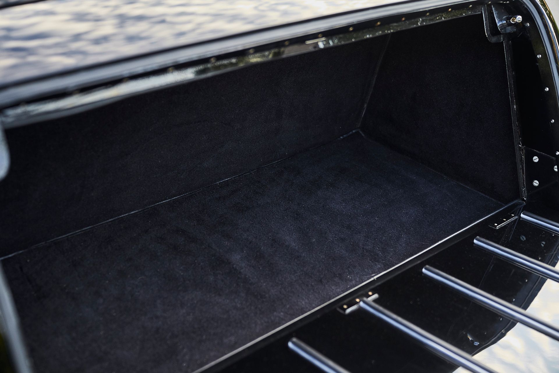 A close up of a trunk of a black car