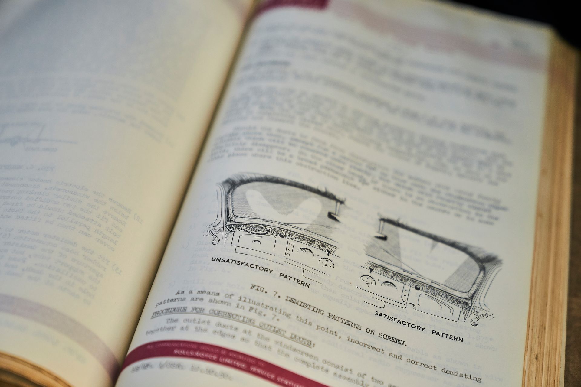 A book is open to a page with a picture of glasses on it