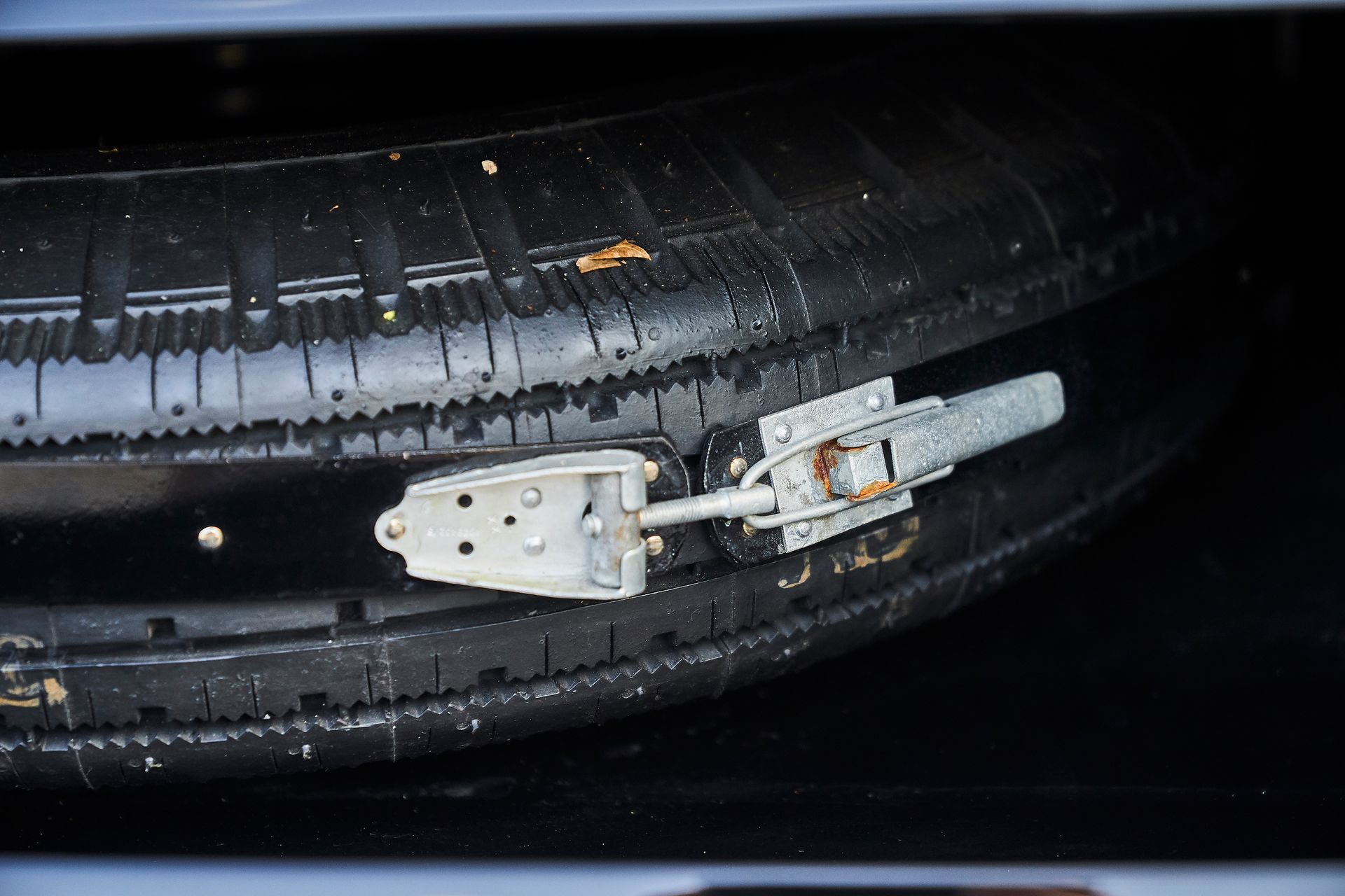 A close up of a tire with a latch on it