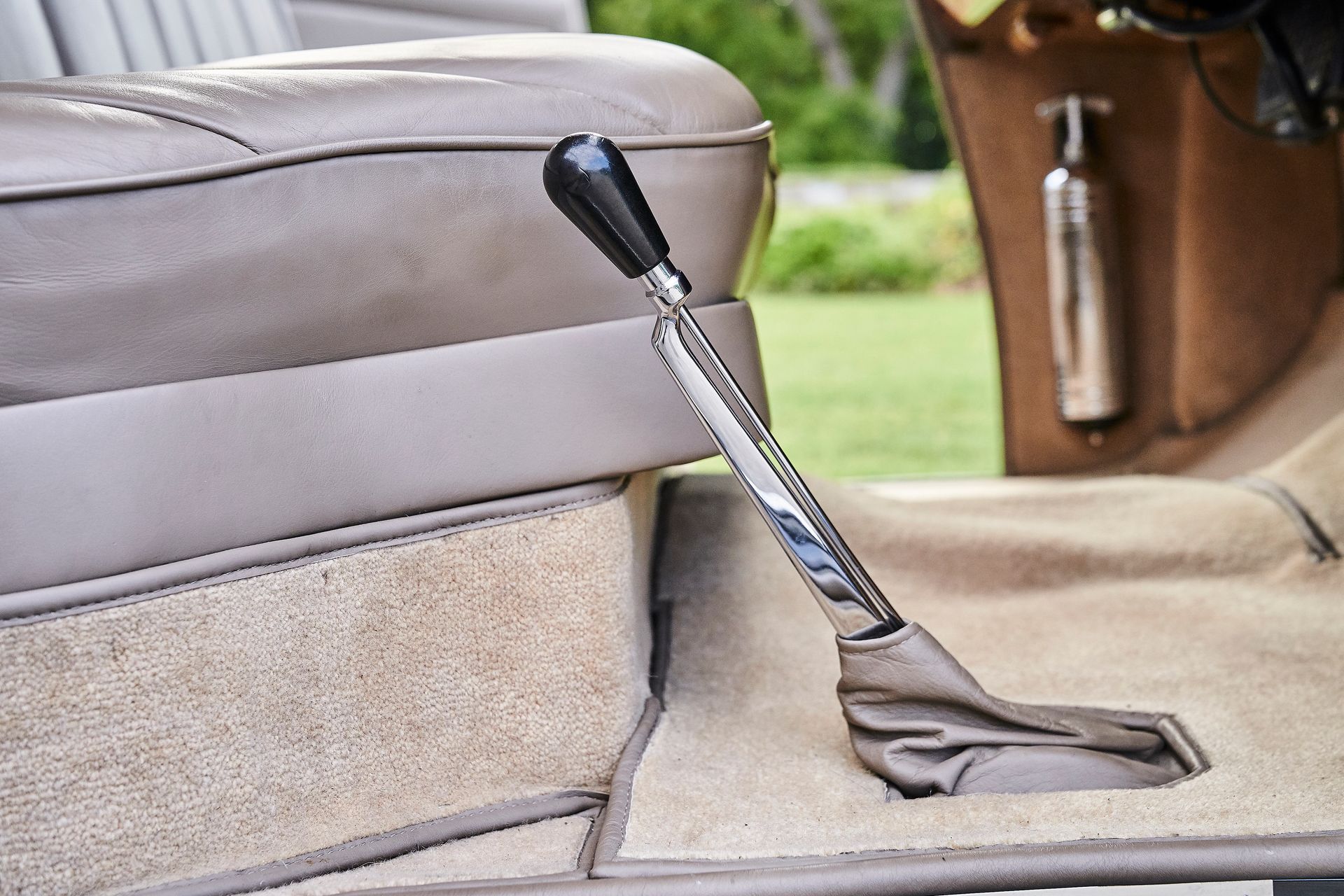 A close up of a shifter in a car