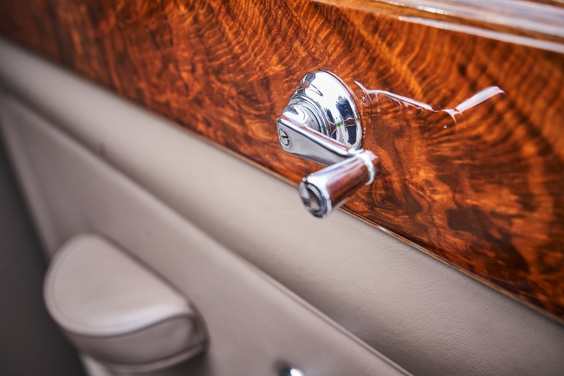 A close up of a door handle on a car door