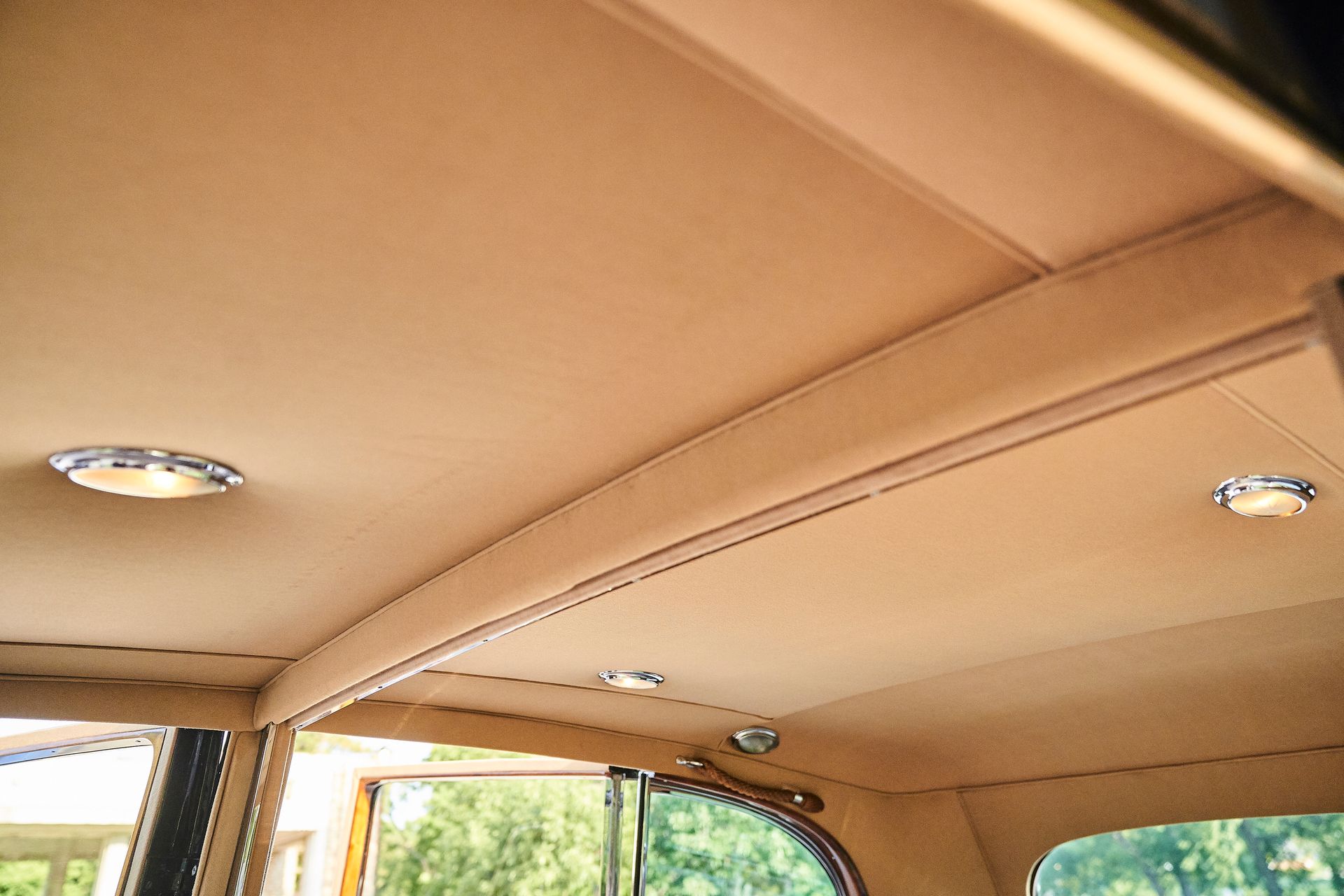 A close up of the ceiling of a car.