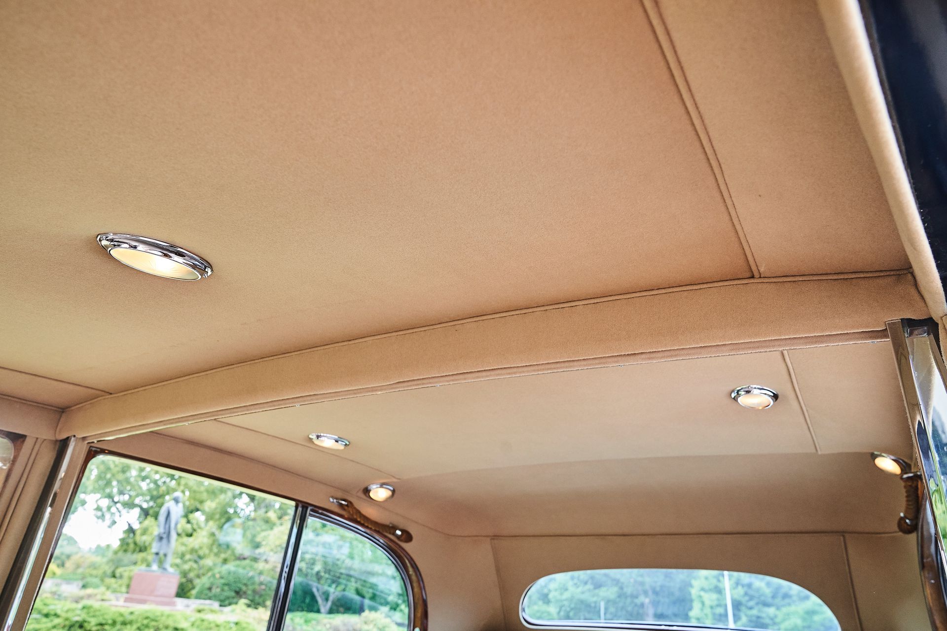A close up of the ceiling of a car.