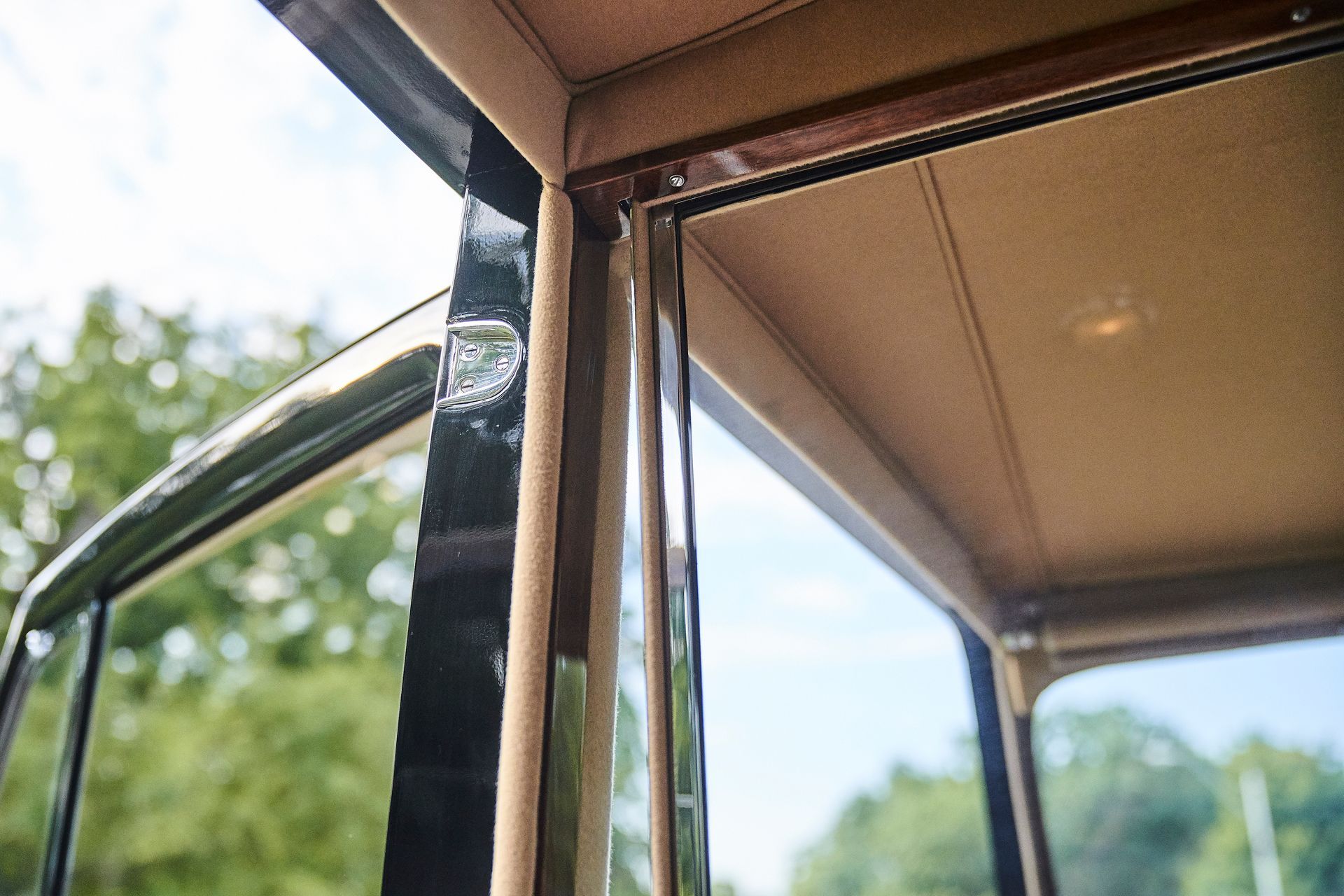 A close up of the inside of a car with the door open.