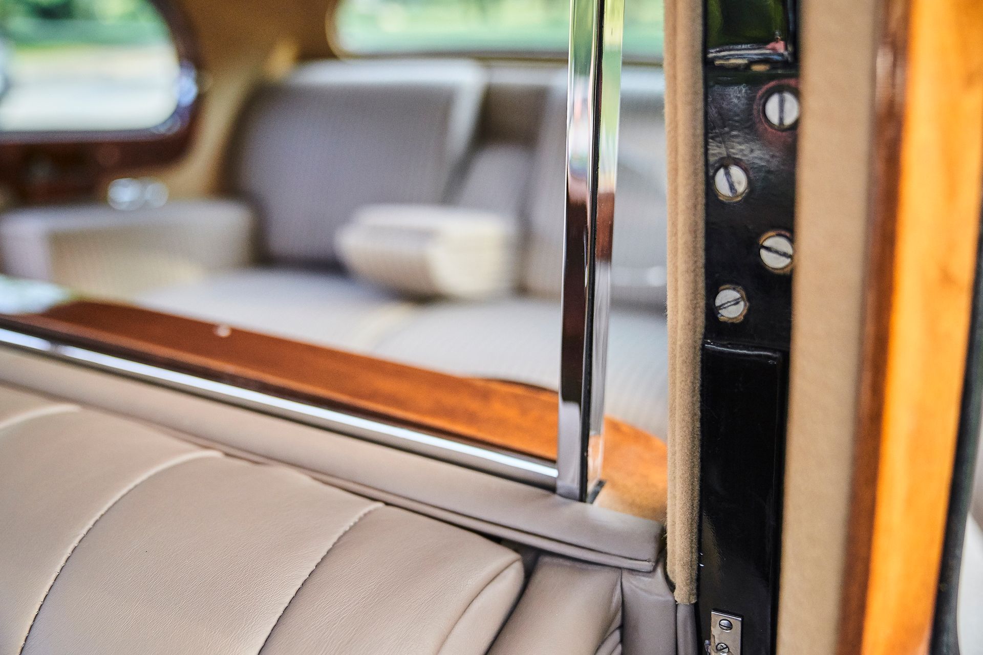 A close up of the back seat of a car.