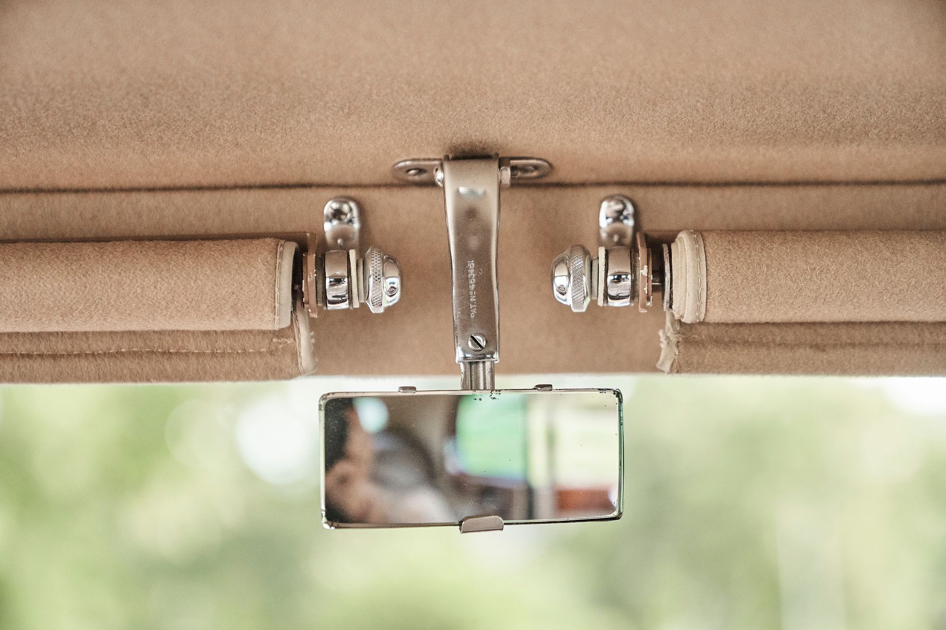 A close up of a rear view mirror in a car